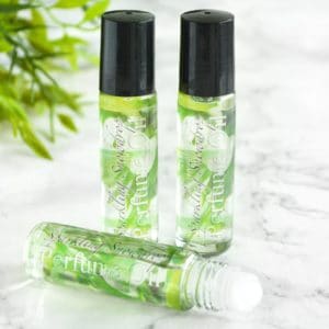 Grønn parfyme med duft av snøklokker